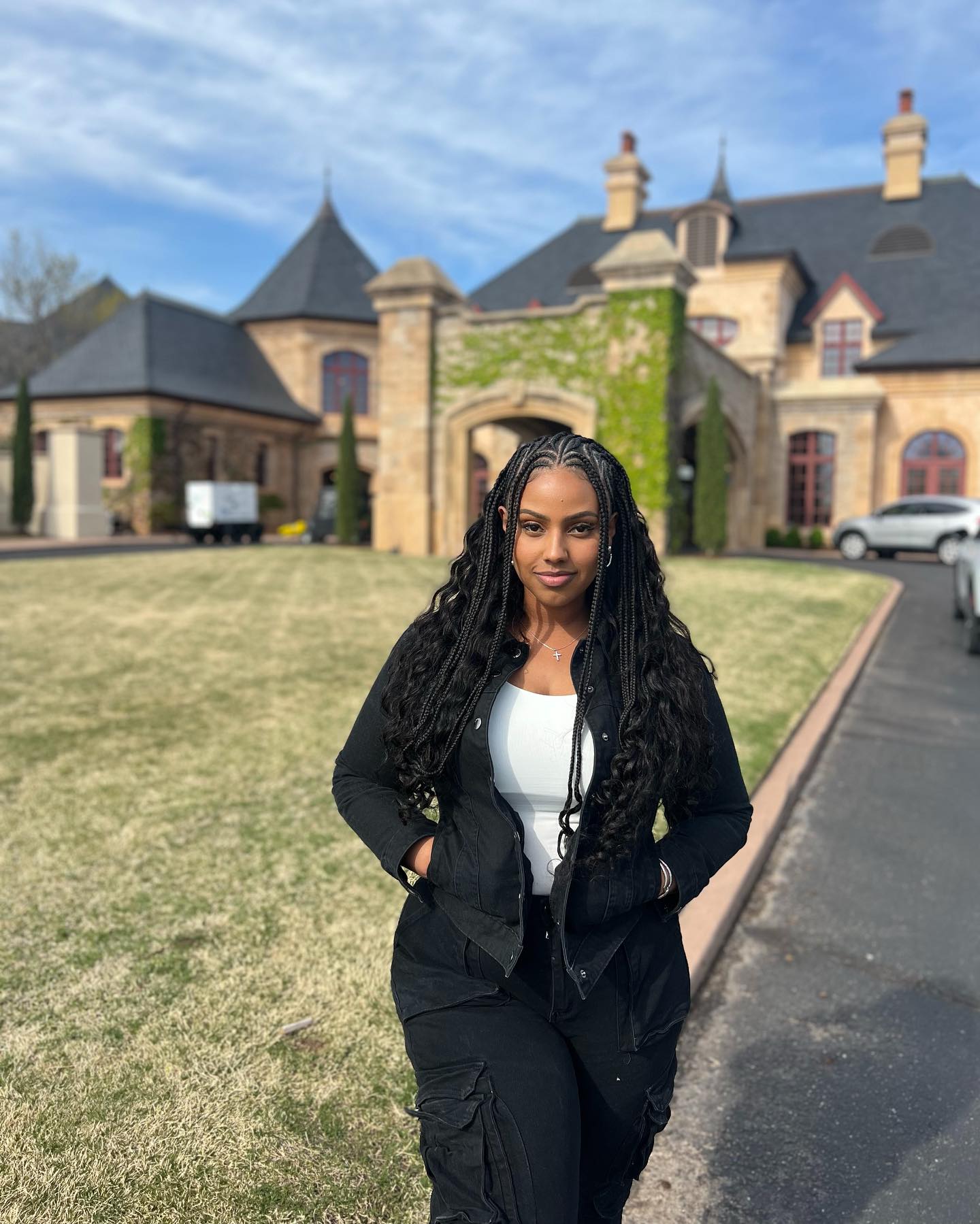 Tadi Tedement in front of a property